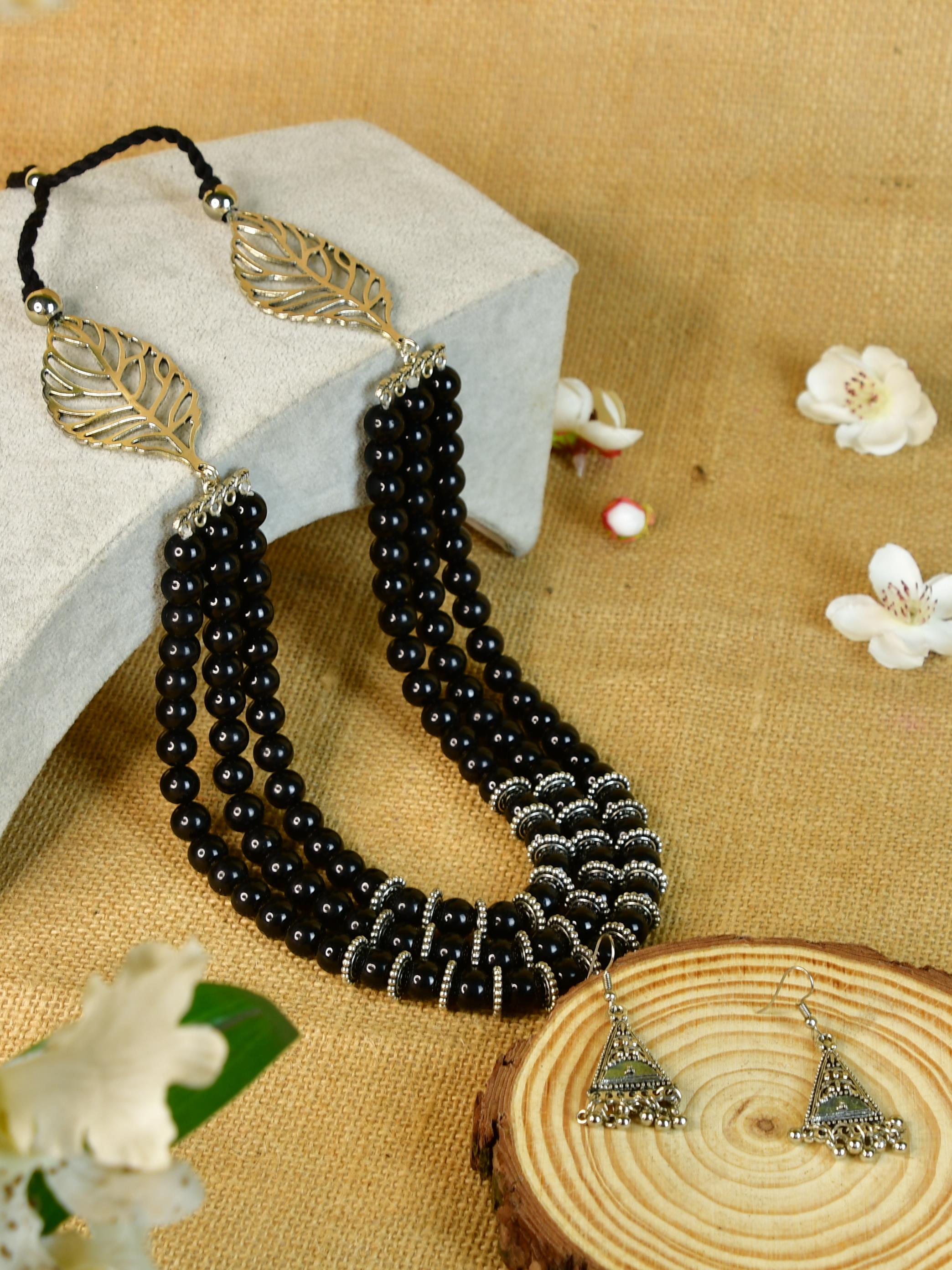 Sowpeace Handcrafted German Silver Necklace: Black Beads & Leaf Design