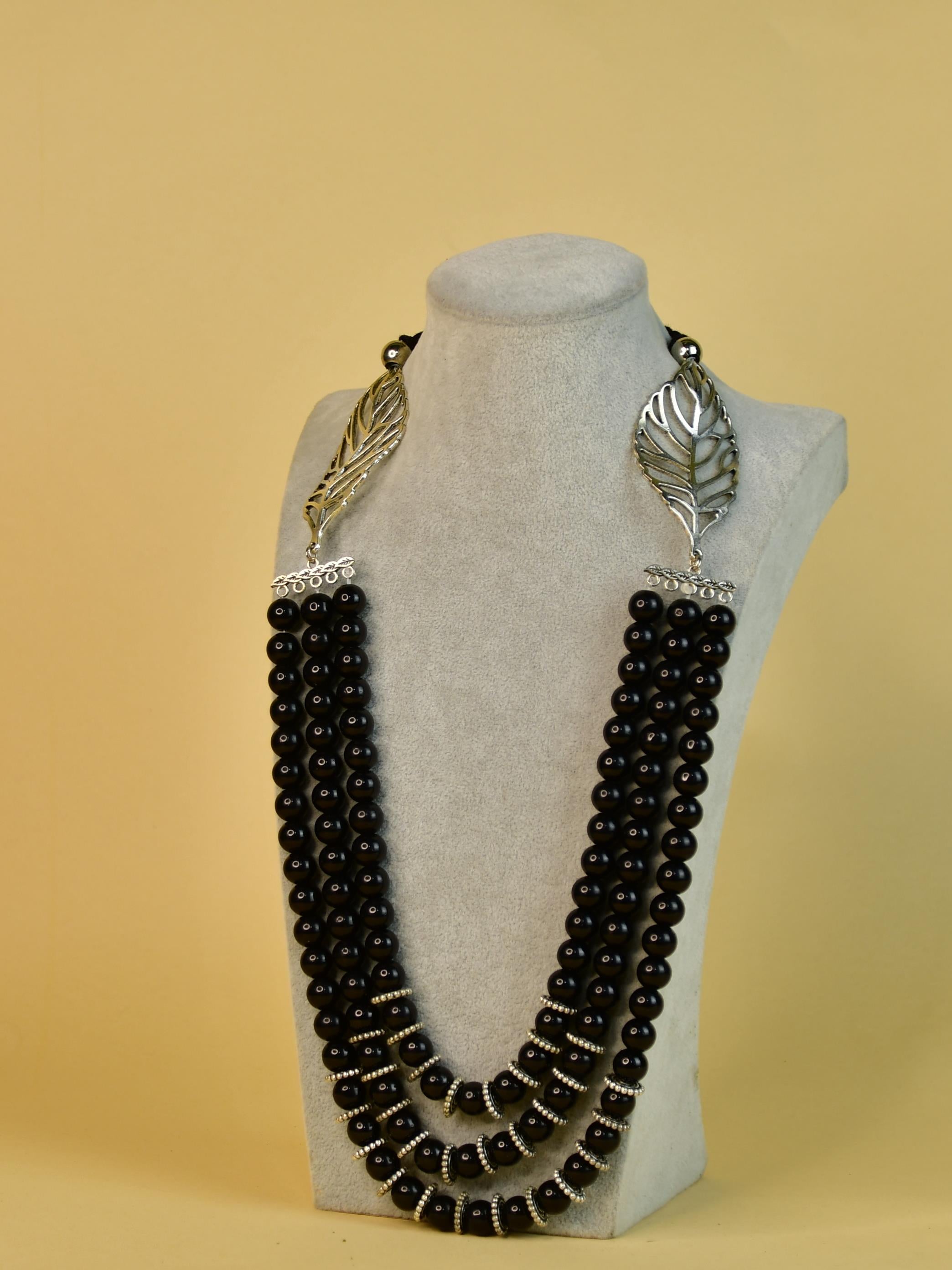 Sowpeace Handcrafted German Silver Necklace: Black Beads & Leaf Design