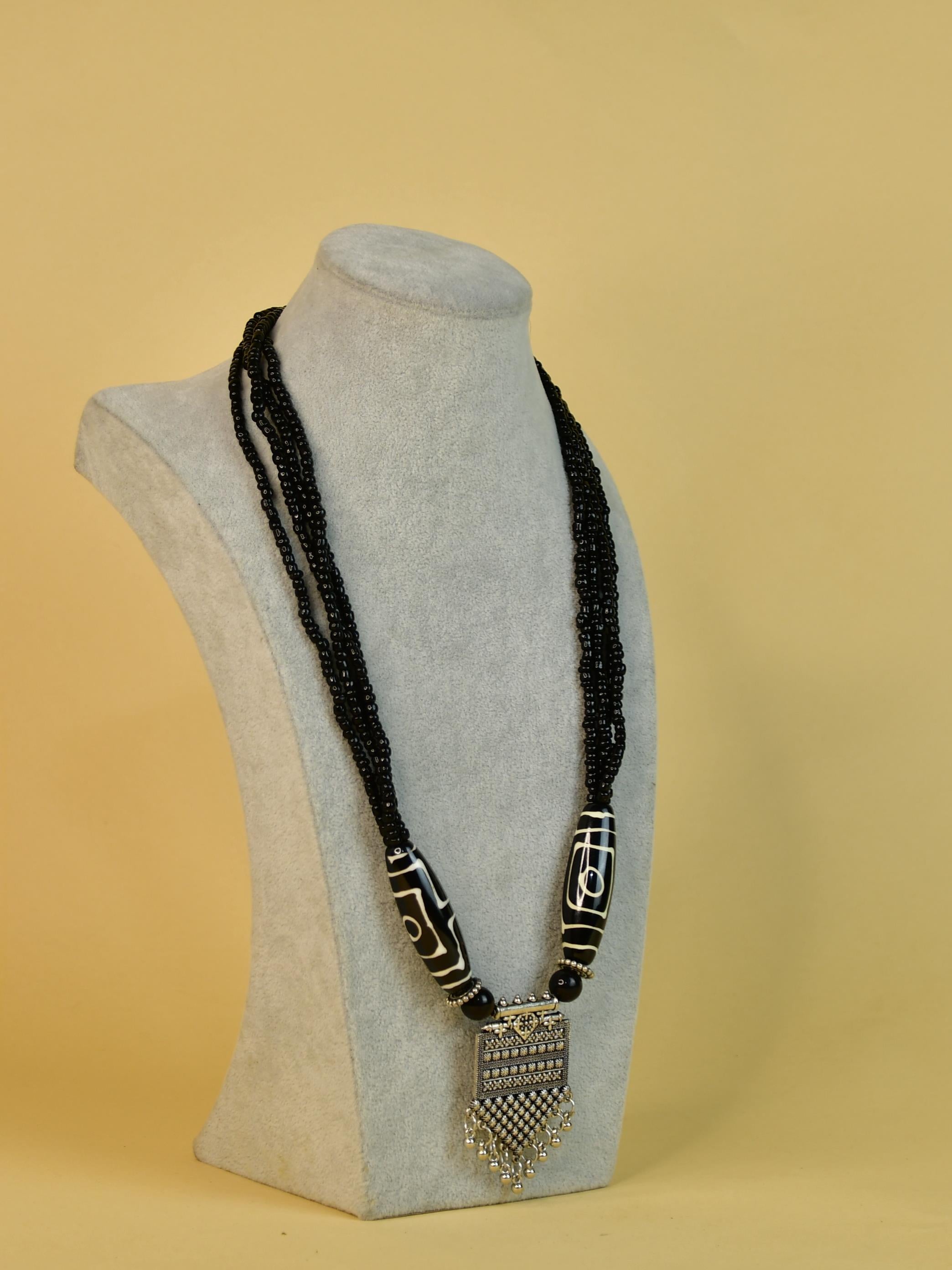 Sowpeace Handcrafted German Silver Necklace: Black Beads & Dzi Pendant