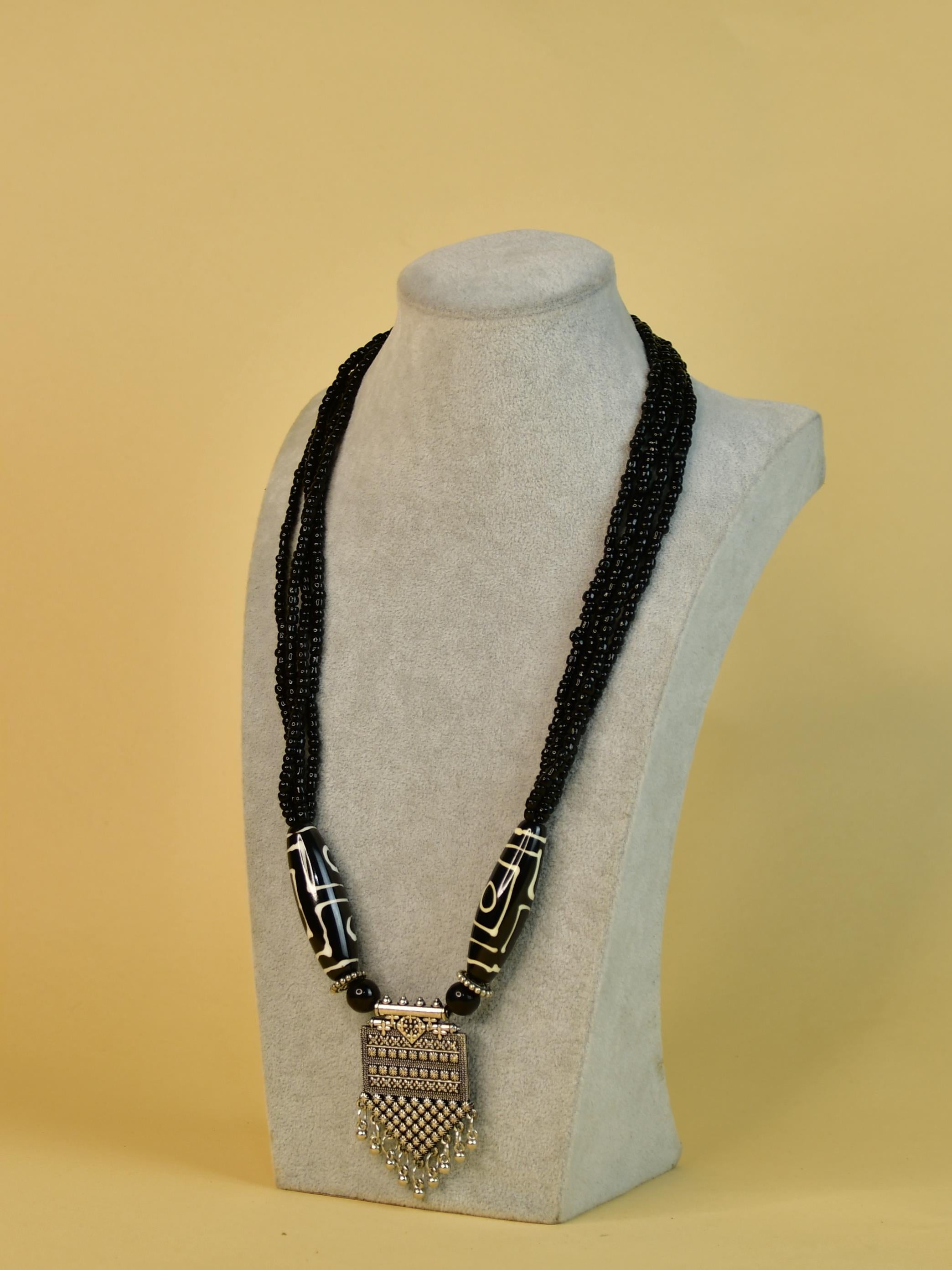 Sowpeace Handcrafted German Silver Necklace: Black Beads & Dzi Pendant